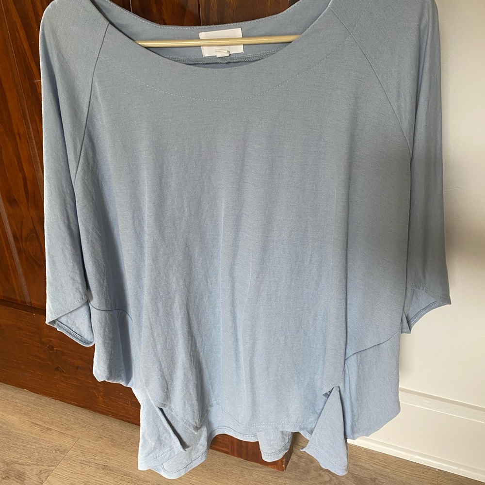 Women’s Heyson drape- style top.